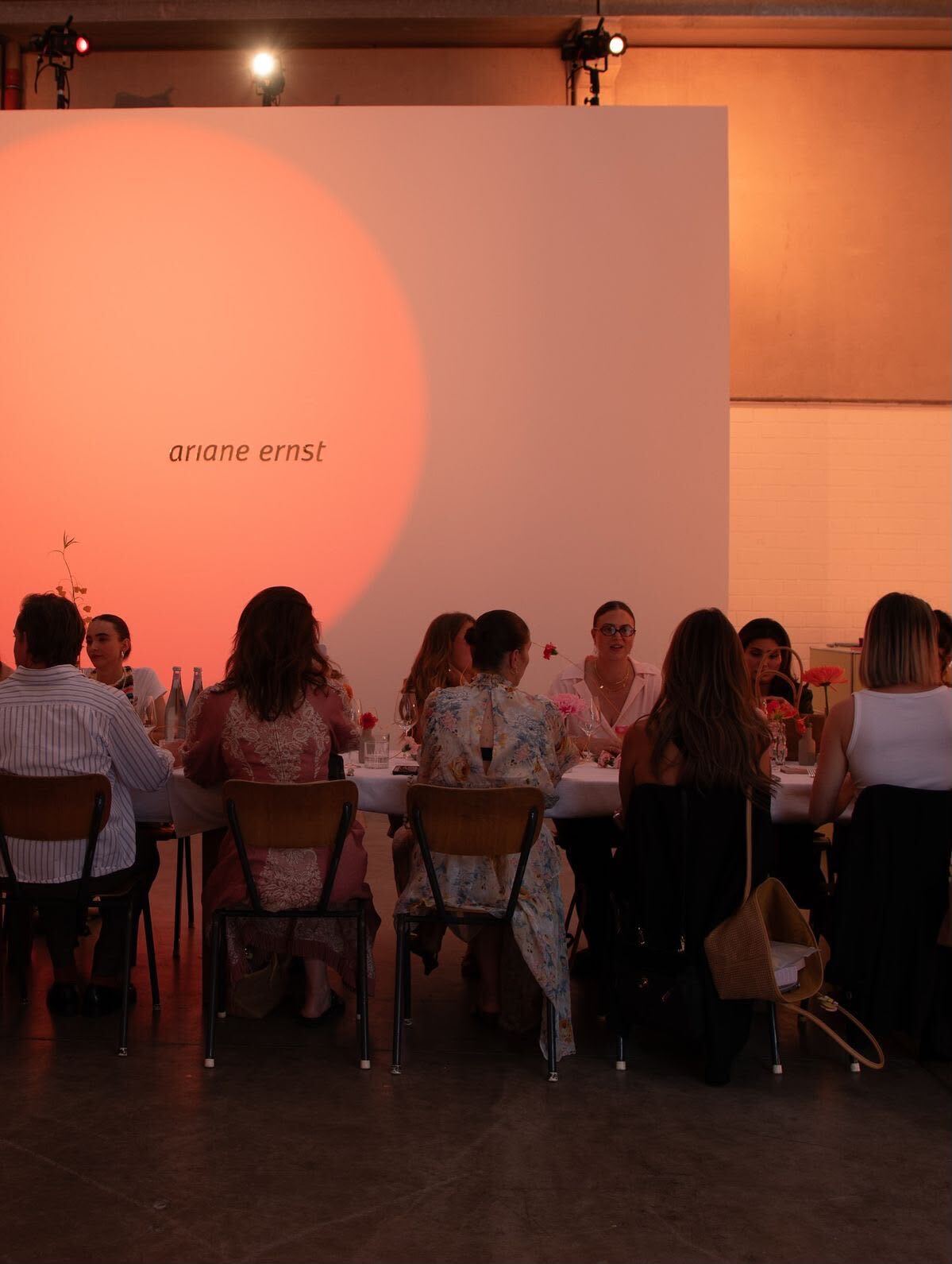 A long dinner table at dusk