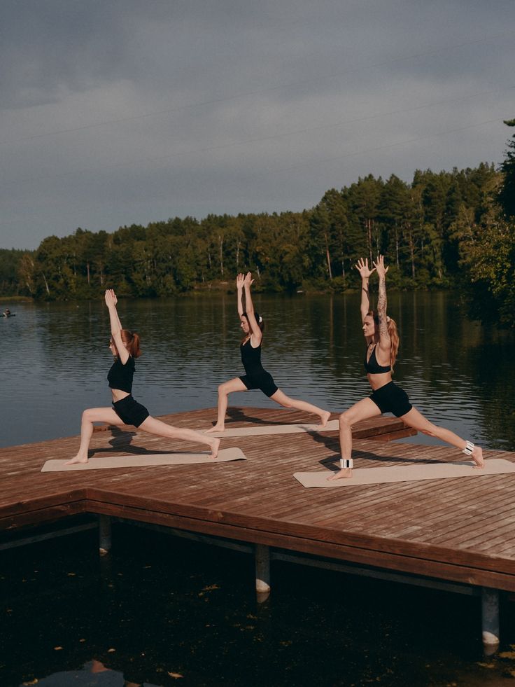 Morning yoga on the dock over the lake